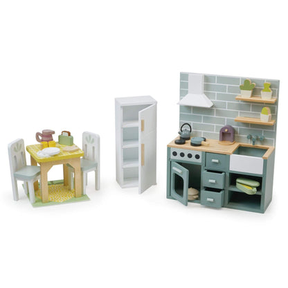 Toy kitchen set with furniture and accessories on a white background