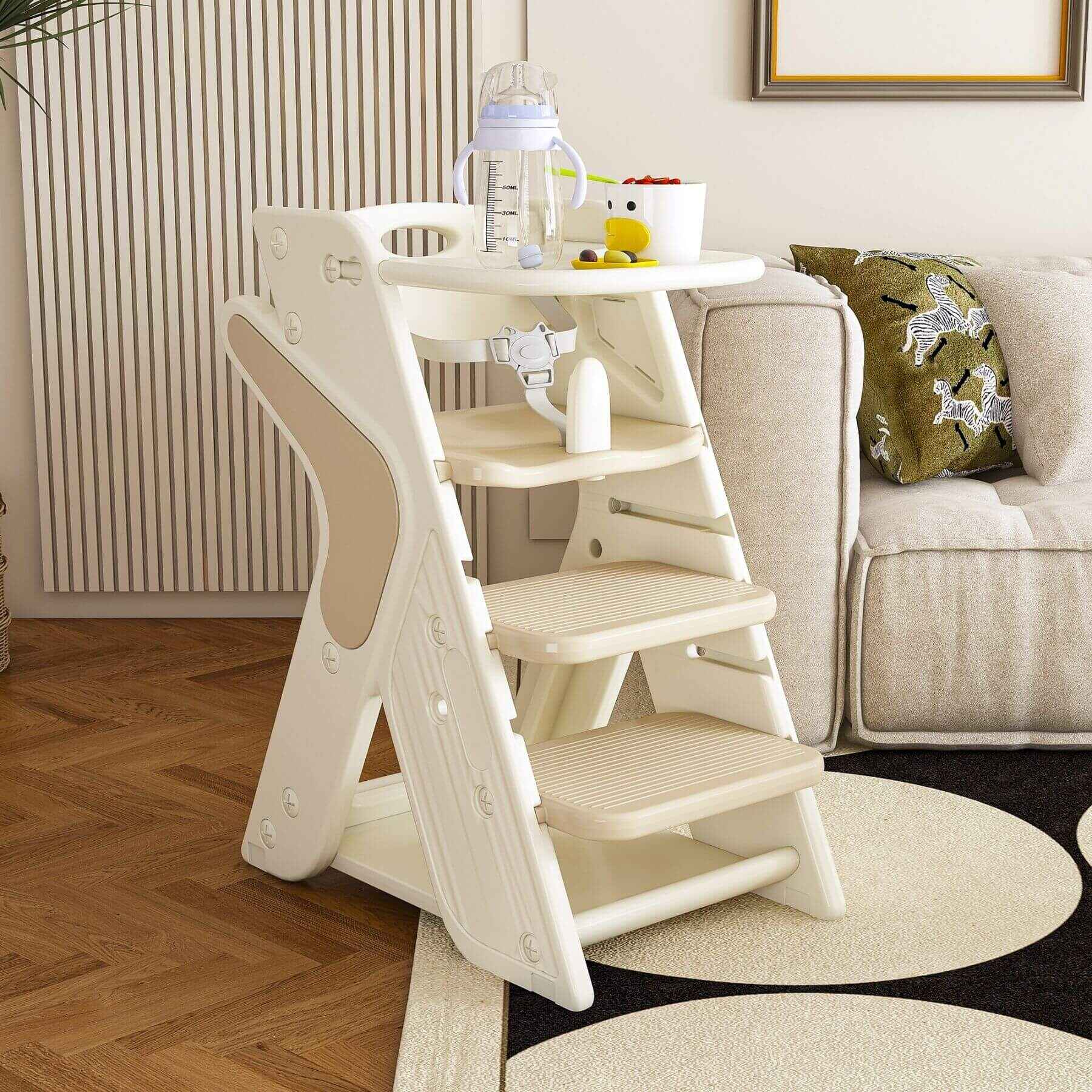 Multi-Functional Growing Up Dining Chair - White & Charcoal in a living room setting with a couch and rug.