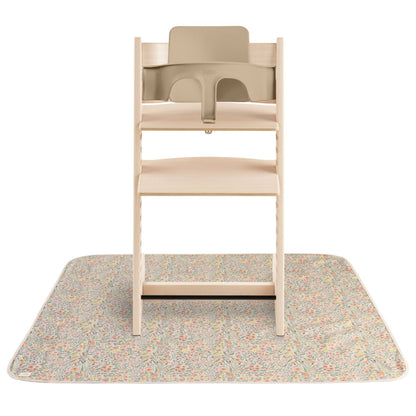 Wooden high chair on Mushie Splat Mat - Pastel Blooms