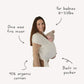 Woman holding a baby in Mushie Baby Wrap Ivory with text highlighting features