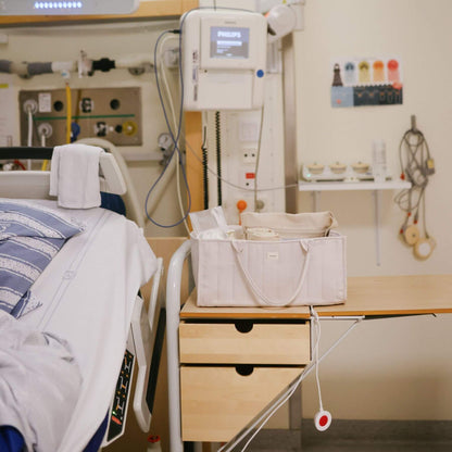 Mushie Diaper Caddy in a holipital room