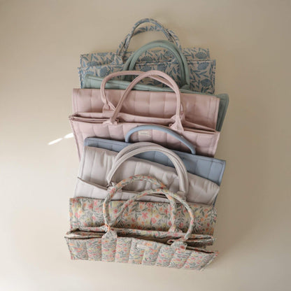 Multiple Mushie Diaper Caddy in different colors