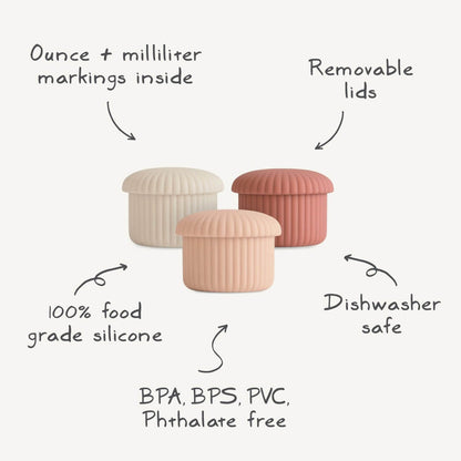 Mushie Silicone Baby Food Containers, surrounded by callout text and arrows describing features