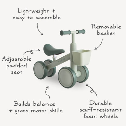 Mushie Mini Toddler Bike with feature callouts on a light gray background