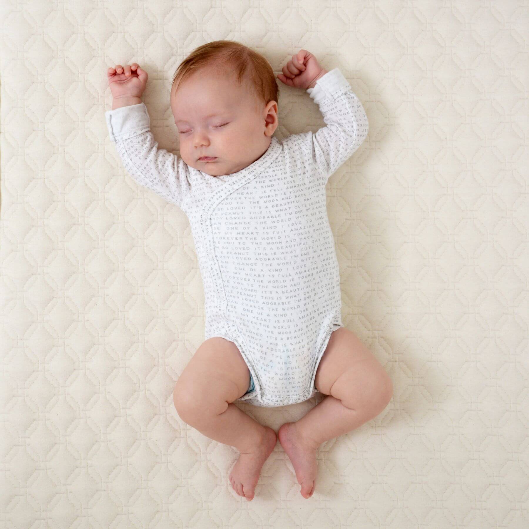 Baby Sleeping on My First Quilted Crib Mattress