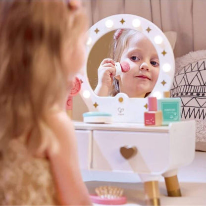 Girl Doing Makeup in front of Hape My Stylish Dressing Table