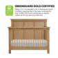 Mystic 4 in 1 Convertible Crib Honey Wood with Greenguard Gold certification label on a white background