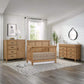 Nursery room with Mystic collection furniture including a crib, dresser, and changing table.