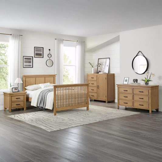 Mystic furniture set including bed, dresser, and nightstands in a room with large windows.