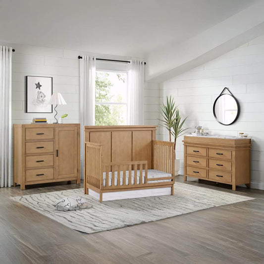 Nursery room with Mystic furniture including a crib, dresser, and changing table.