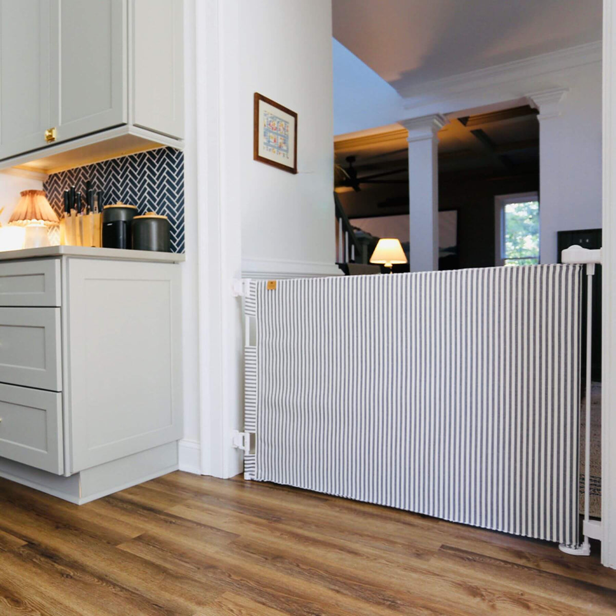 Kitchen with a white radiator on a wooden floor