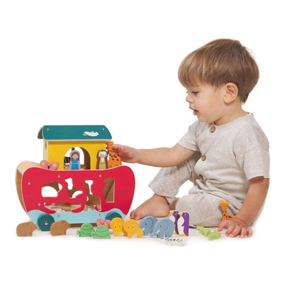 Child playing with Tender Leaf Noah's Shape Sorter Ark