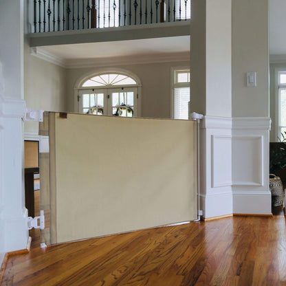 Room divider in a home interior with Crafted Gates Co. Oil Waxed Canvas Pet Safety Gate - Tan and white walls.