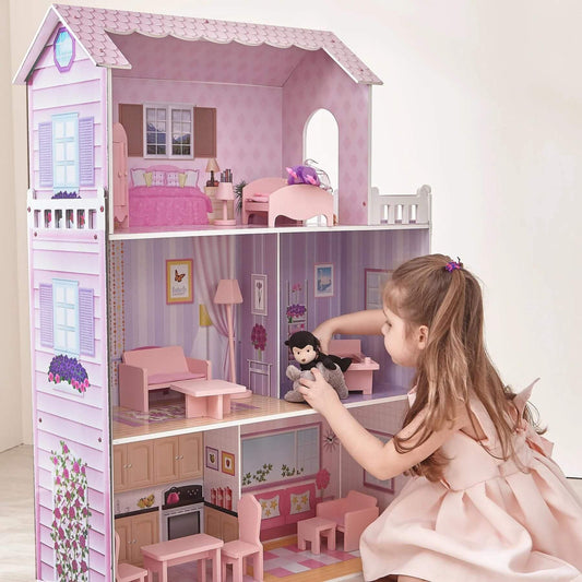 Girl Playing with Olivia's Little World Dreamland Tiffany Dollhouse