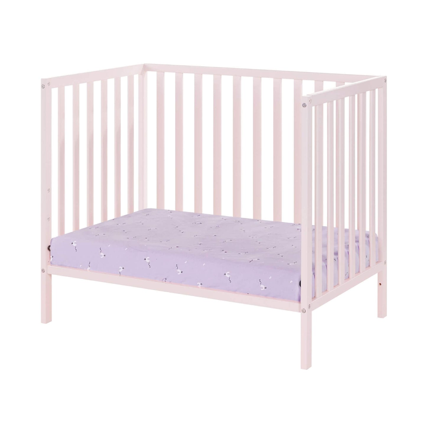 Pink crib with a purple mattress on a white background