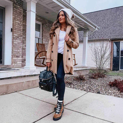 Woman Holding Luli Bebé Petit Monaco Diaper Bag | Ebony Black