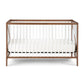 Front View of Pixie Zen 3-in-1 Crib in Walnut/White