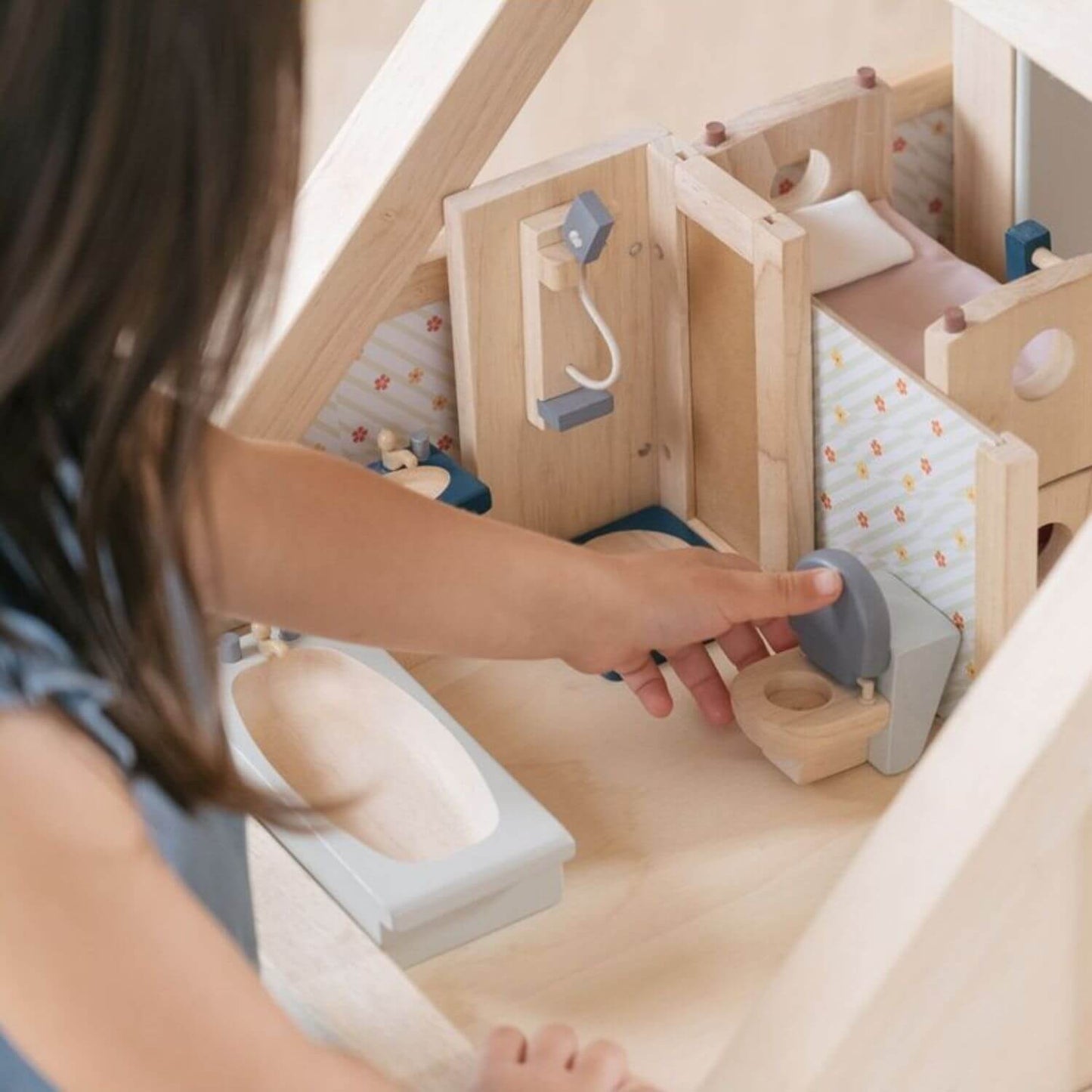 Girl Playing PlanToys Bathroom - Orchard