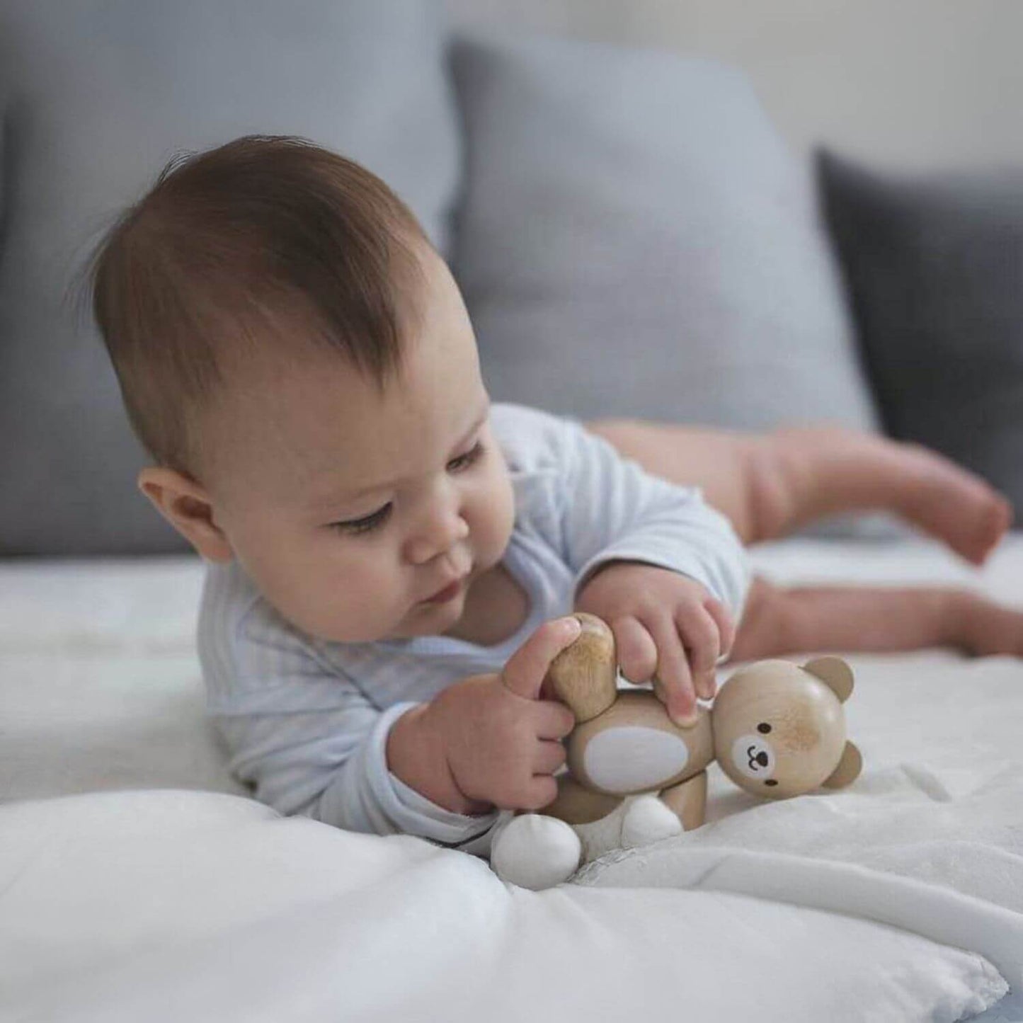 Baby Playing PlanToys Bear