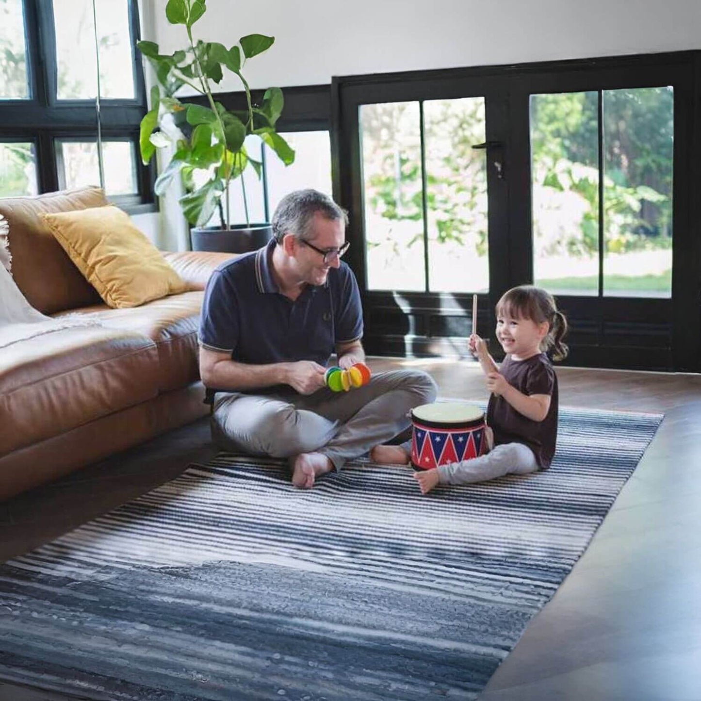 Dad & Girl Playing PlanToys Big Drum II