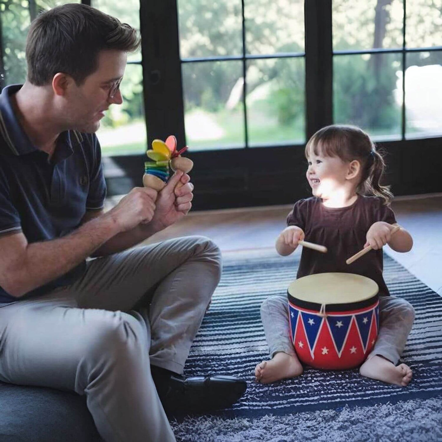 Dad & Girl Playing PlanToys Big Drum II