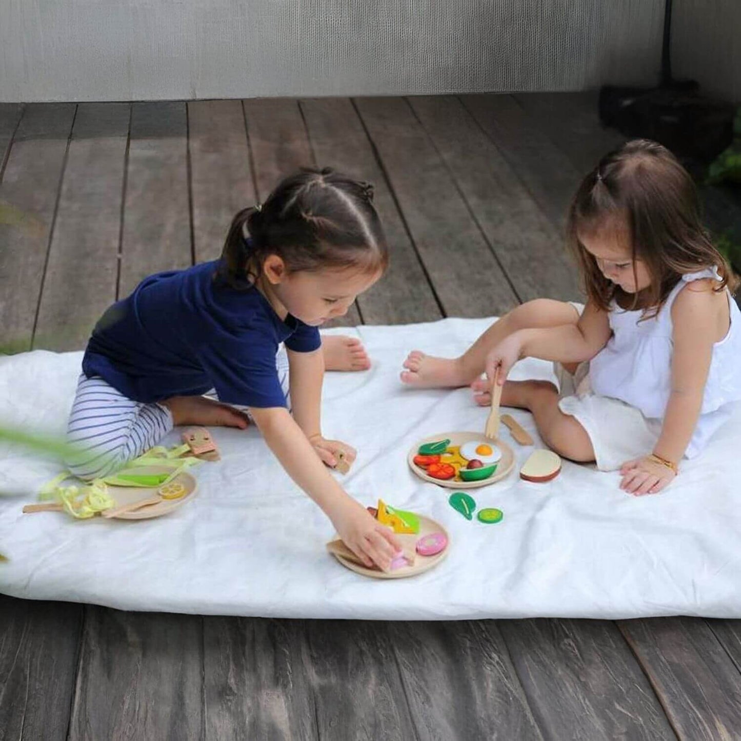 Girls Playing PlanToys Breakfast