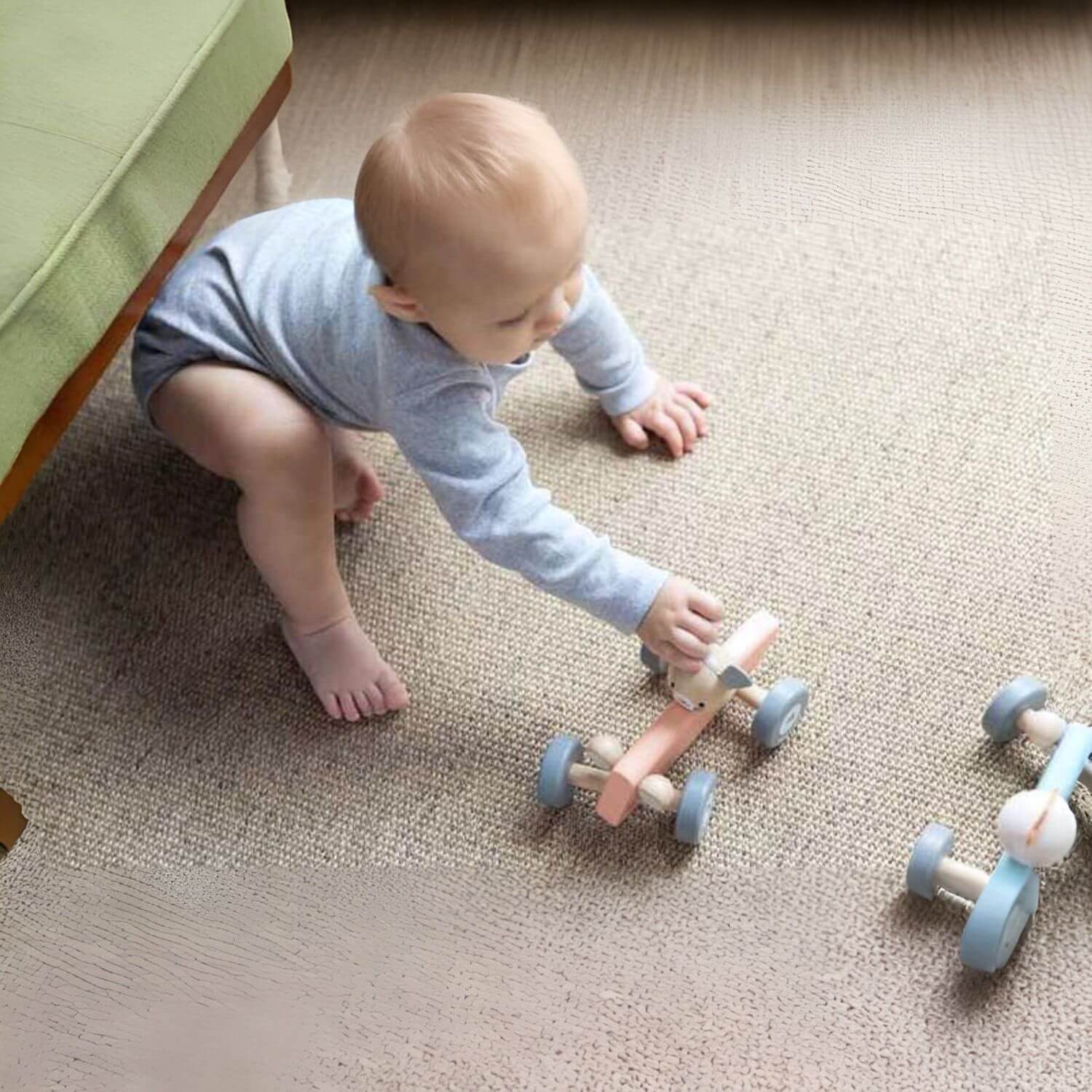 Baby Playing PlanToys Chicken Racing Car