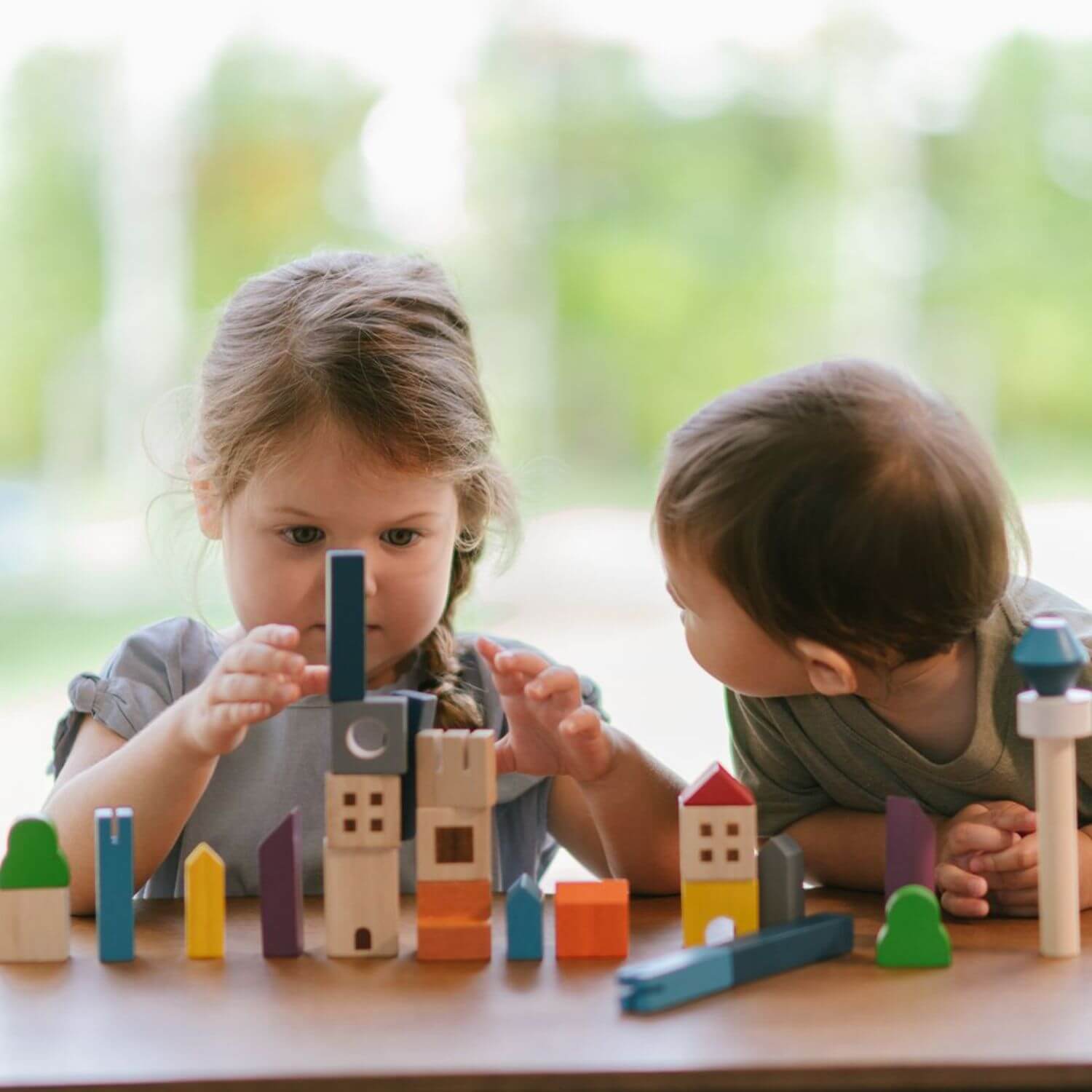 Kids Playing PlanToys Cityscape Blocks