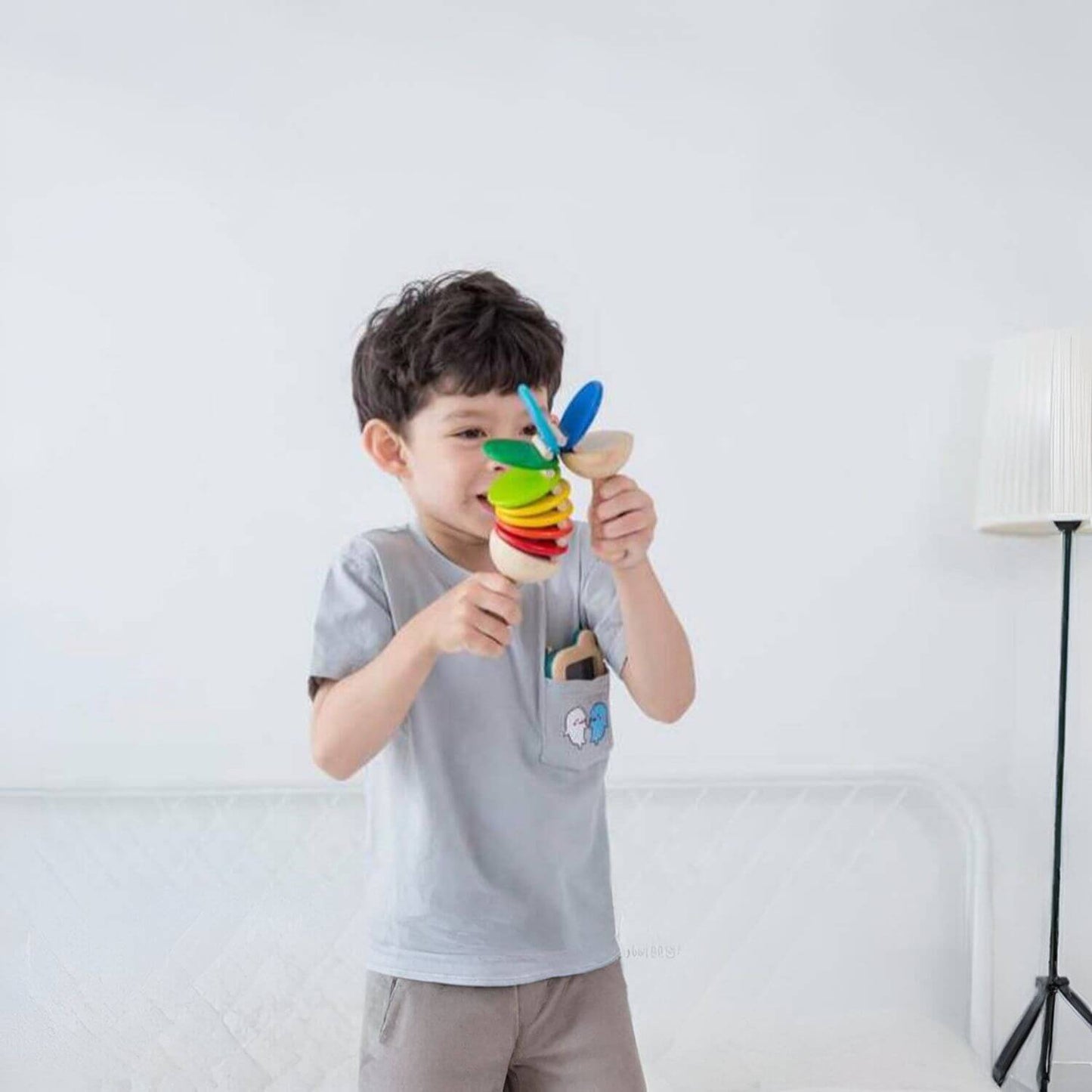 Boy Playing PlanToys Clatter