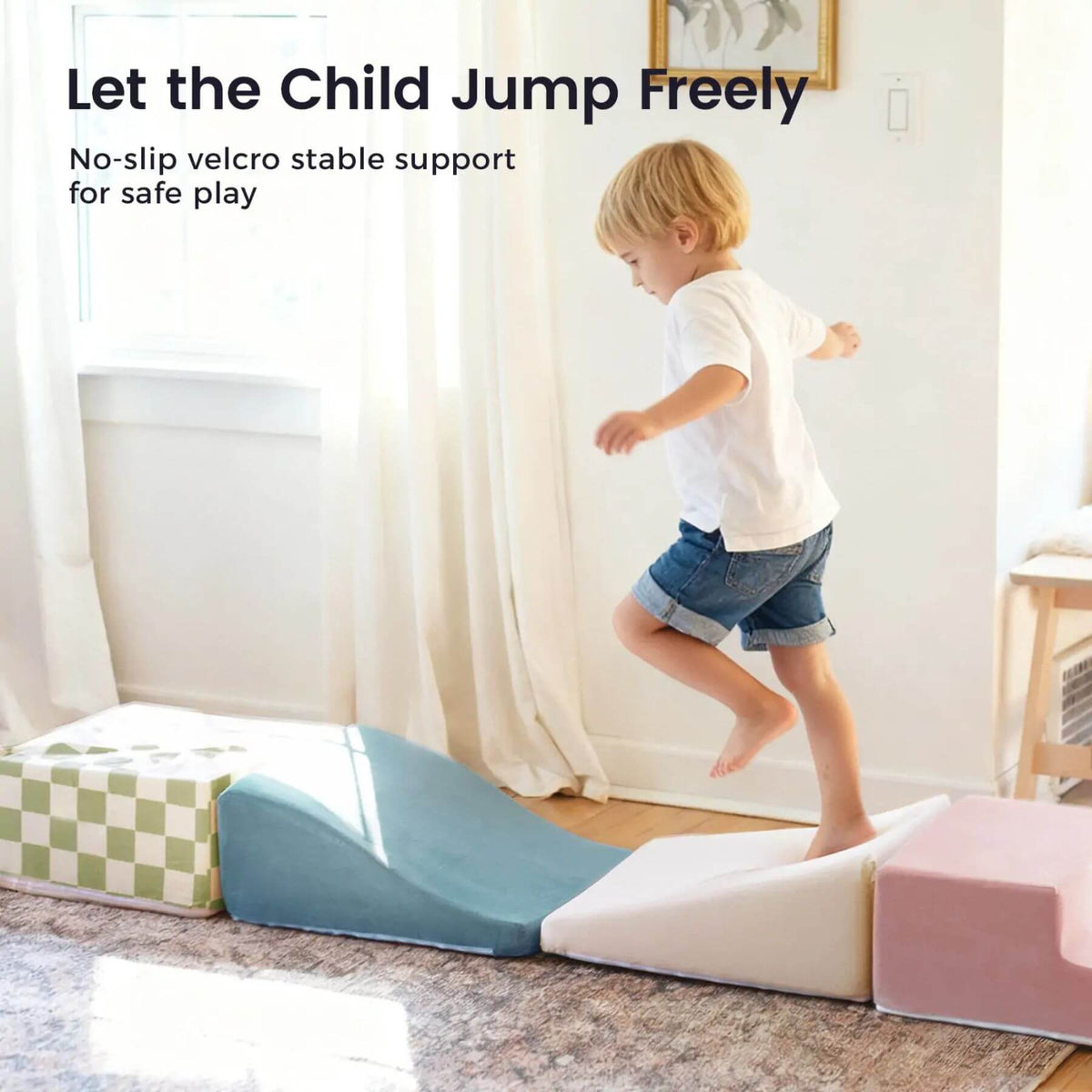 Child playing on Tiny Land® PlayNest Climbing Blocks - Morandi with text about no-slip velcro support.