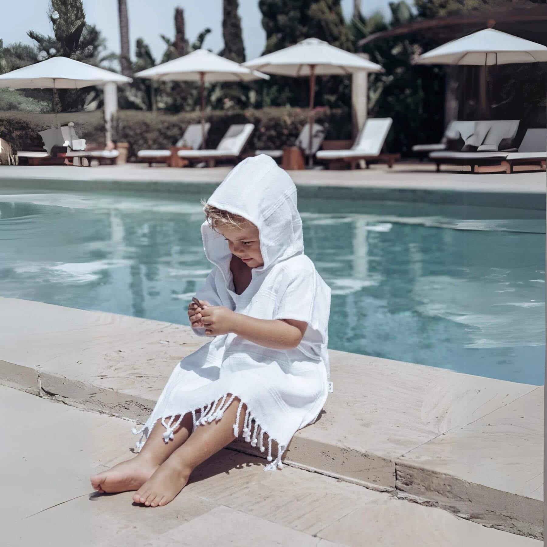 Boy Wearing Unique Love Design Poncho Pure White