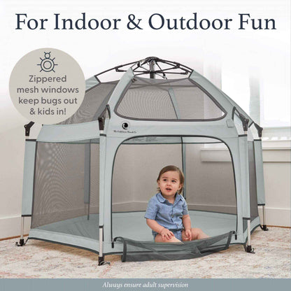 Baby Sitting inside Pop 'N Go™ Playpen Light Gray