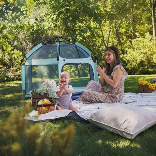 Mom & Baby Playing outside of The California Beach Co. Pop 'N Go™ Playpen Mint