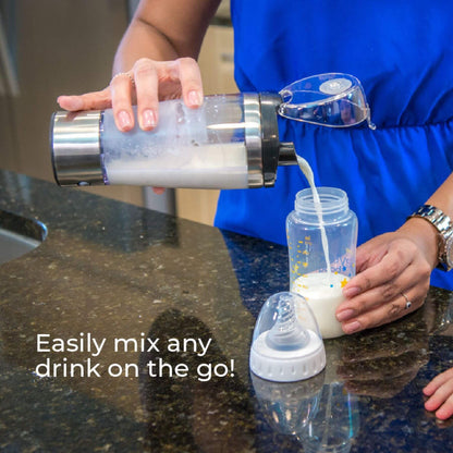 Person Pouring milk from Primo Passi Portable Formula Mixer to a bottle