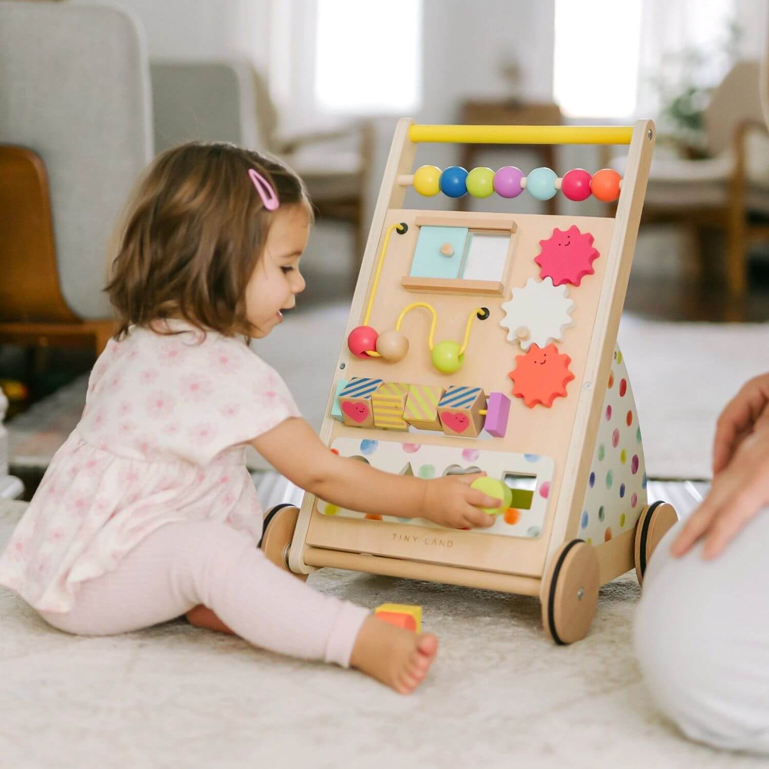 Girl Playing Tiny Land® Premium Natural Wooden Activity Walker