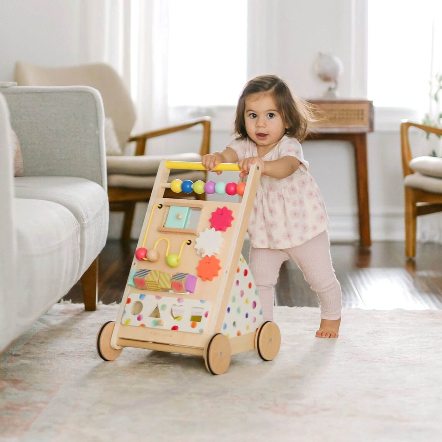 Girl Pushing Tiny Land® Premium Natural Wooden Activity Walker