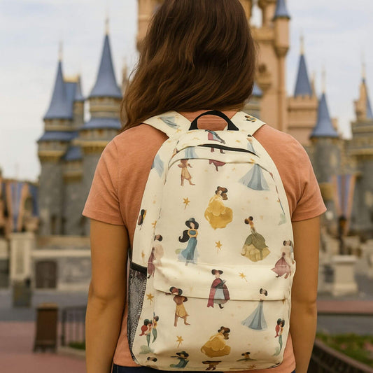 Person wearing Princess Magic Backpack in front of a castle.