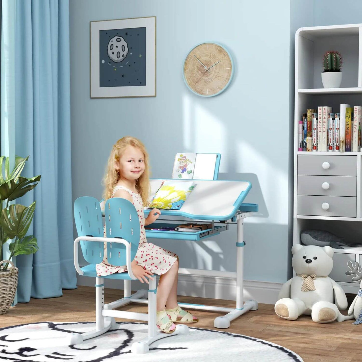 Girl Sitting at Qaba Adjustable Kids Desk Blue