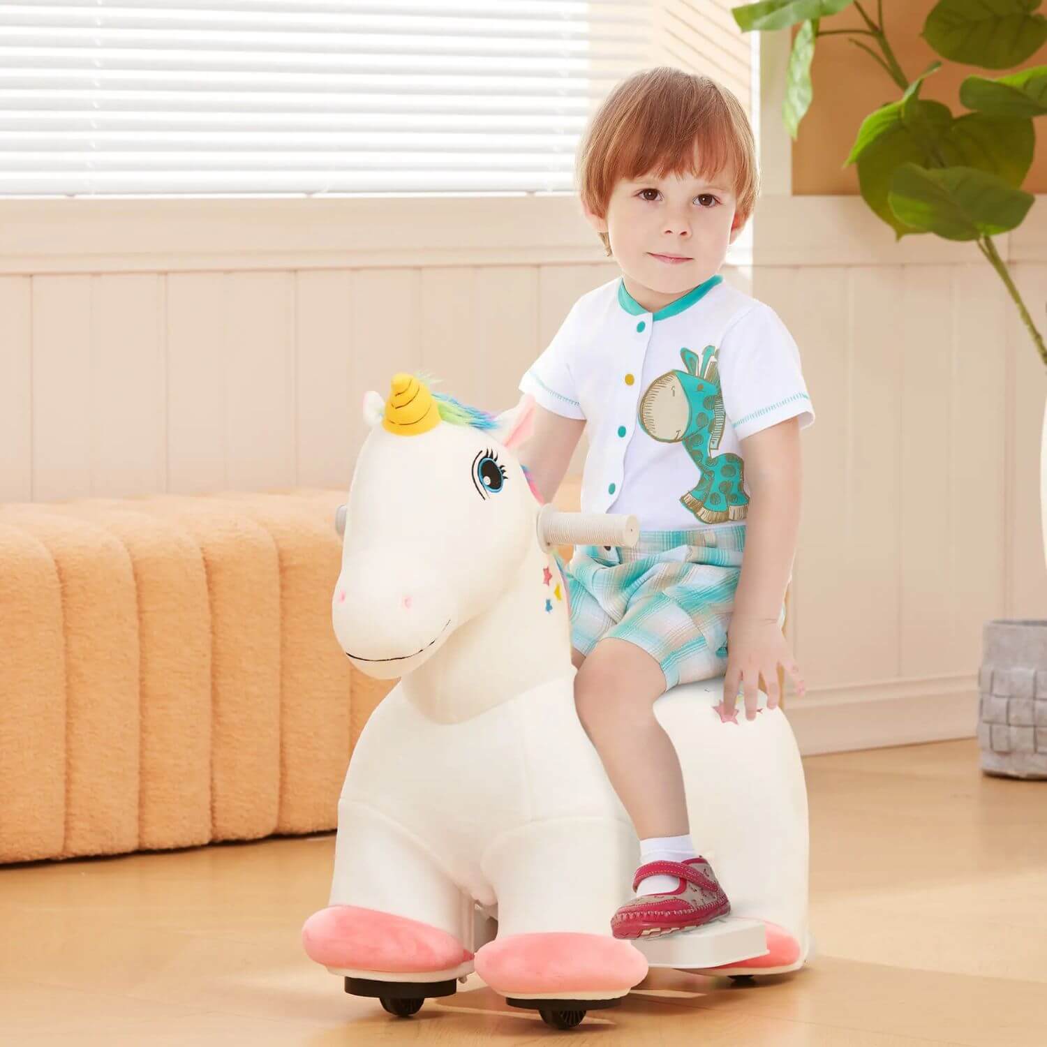 Boy Riding Qaba 6V Battery Powered Ride on Unicorn White