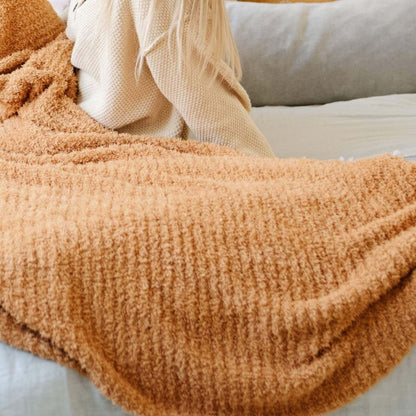 Saranoni Ribbed Bamboni® XL Blanket - Golden draped over a surface with a neutral background
