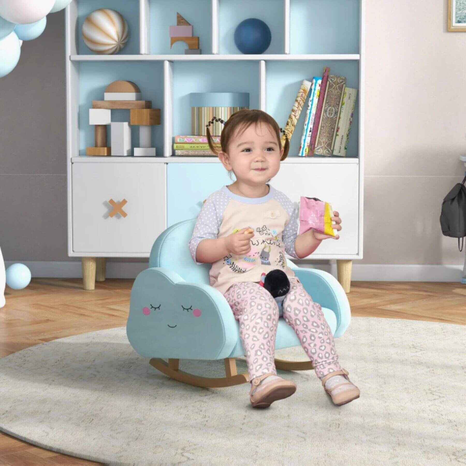 Girl Sitting on Qaba Rocker Armchair for Nursery Playroom Preschool for 1.5-5 Years Blue