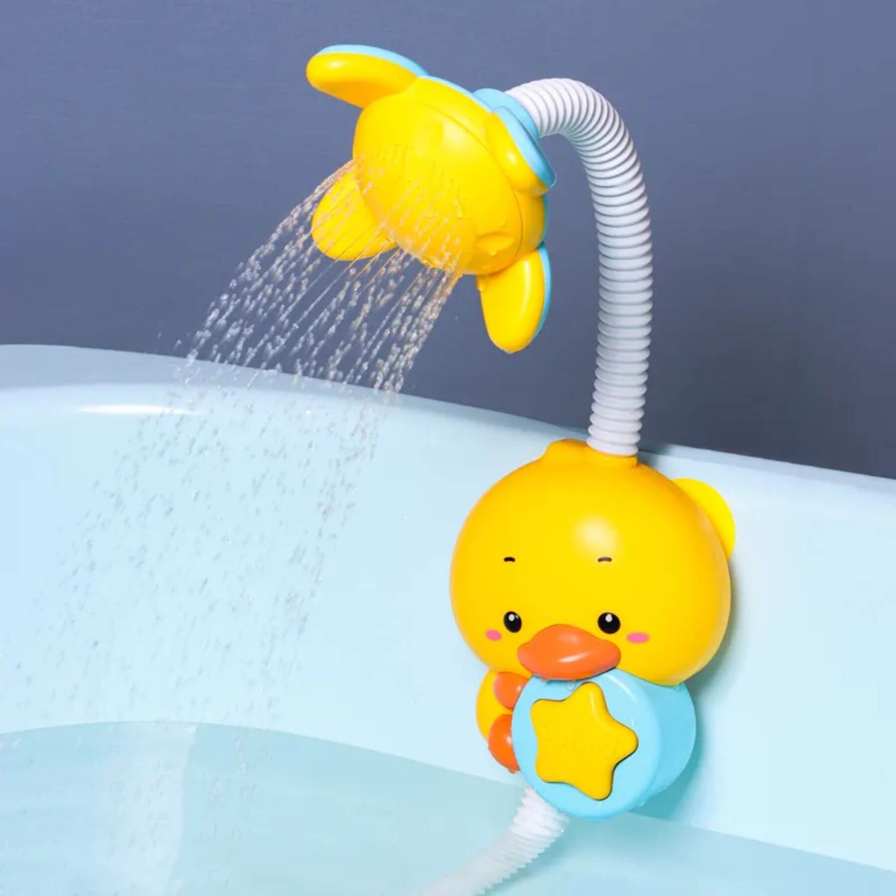 Yellow duck bath toy with a shower head in a bathtub