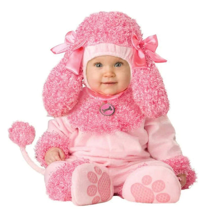 Baby in a pink poodle costume with a white background