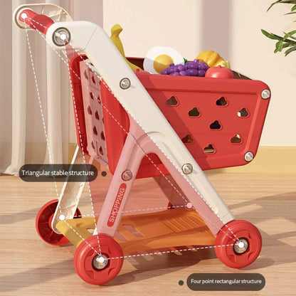 RocketBaby USA Shopping Cart Toy with a basket filled with fruits on a wooden floor.