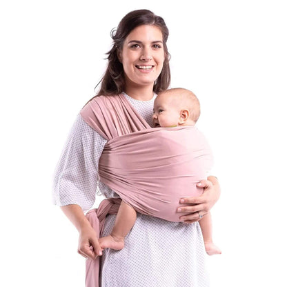 Woman holding a baby in RocketBaby USA Cotton Baby Wrap against a white background