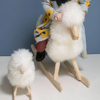 Two Sizes of Rocking Sheep made of Pine Wood covered with Sheepskin, Short Wool, Off White