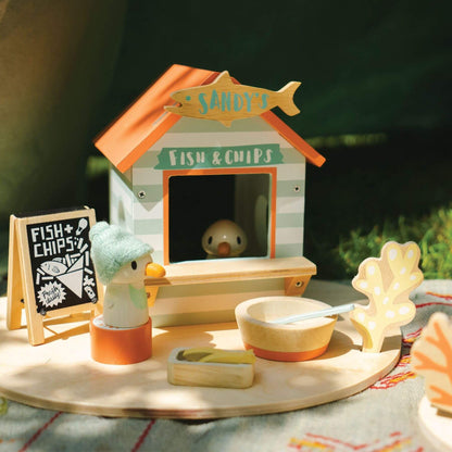 Tender Leaf Sandy's Beach Hut on a table outdoors.