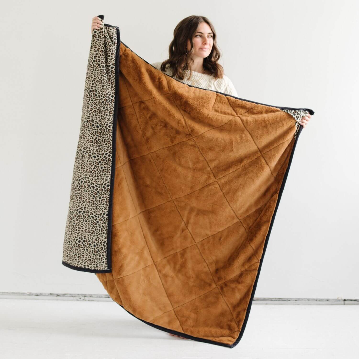 Woman holding Saranoni Outdoor Blanket