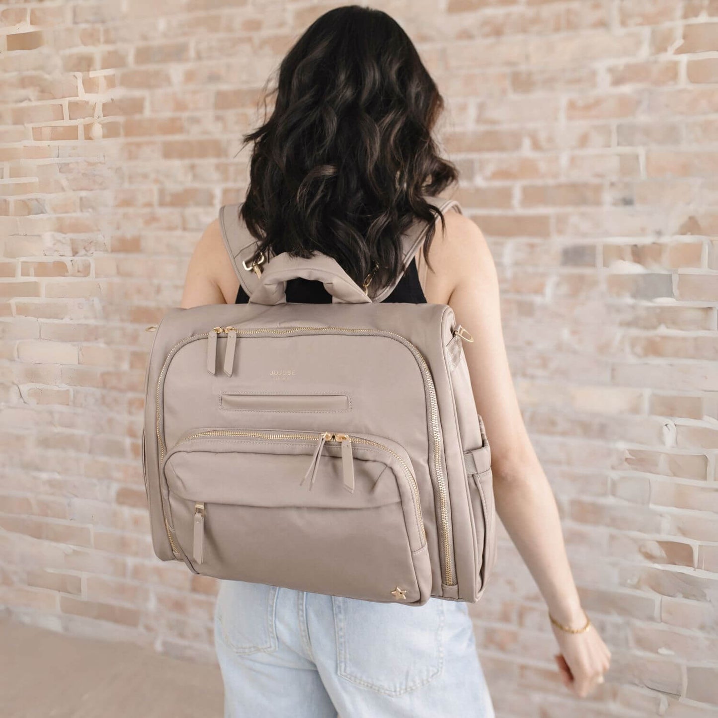 Woman Carrying JuJuBe Satchel Diaper Bag Taupe