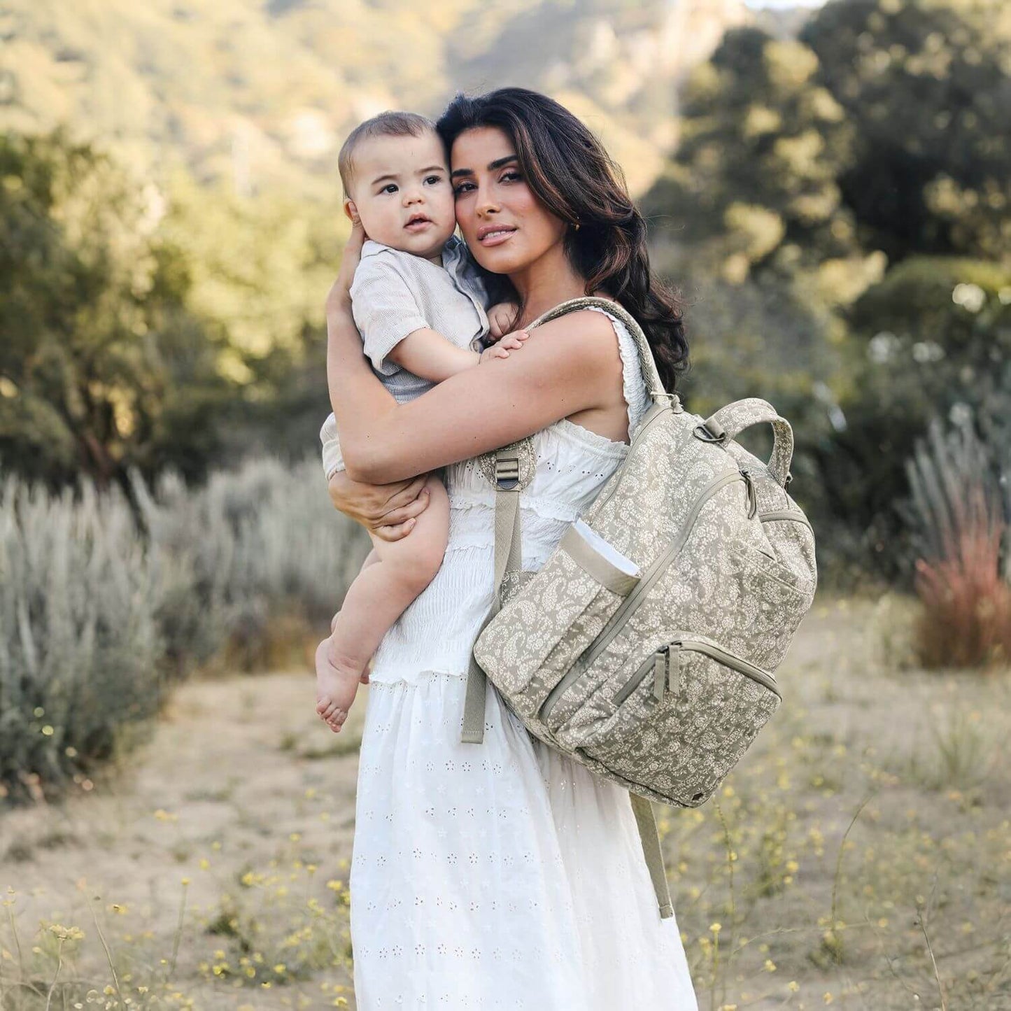 Woman Should Carrying Sazan + JuJuBe Classic Diaper Backpack - Paisley Floral